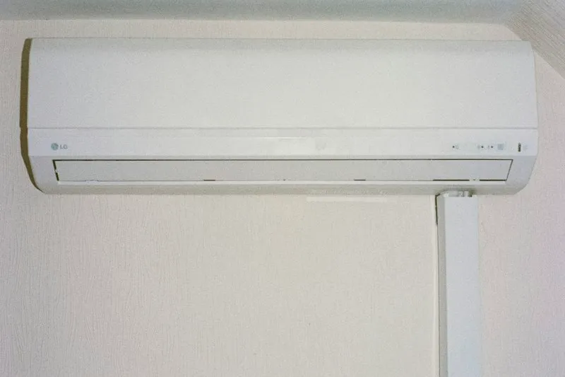 Freshly cleaned split-type aircon indoor unit mounted on a white wall