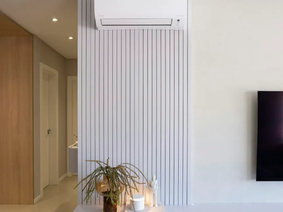 Modern condo living room with a wall-mounted split-type aircon